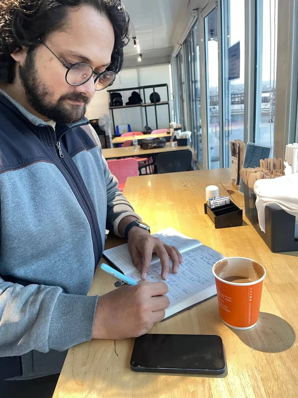 Planning with pen and paper over coffee